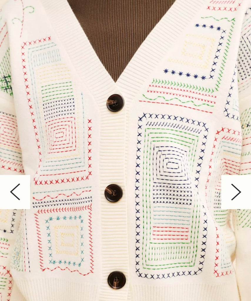 Unknown Sweater 8 ounces White with multicolored embroidery (red, green, blue, yellow)